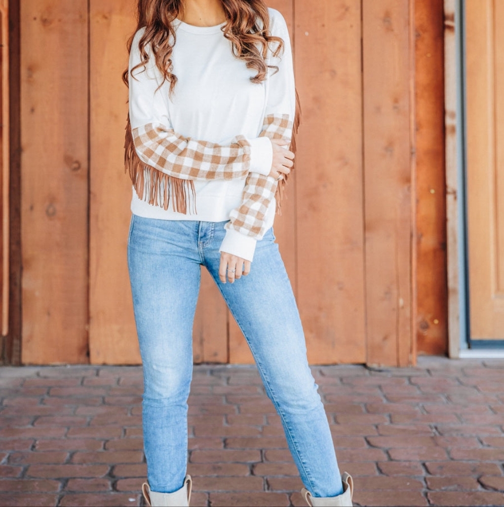 White Sweater with Brown Fringe and Buffalo Check Sleeve
